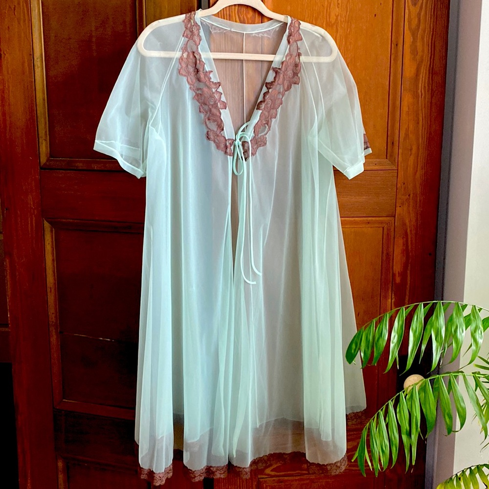 Vintage lingerie in blue with brown lace trim. String tie in front. Sz Large.